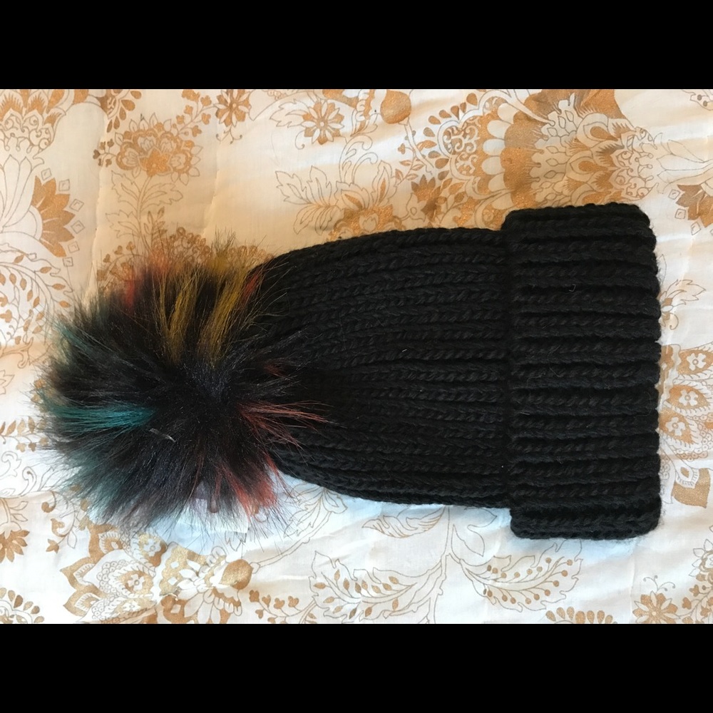 Black beanie hat with colorful Pom Pom